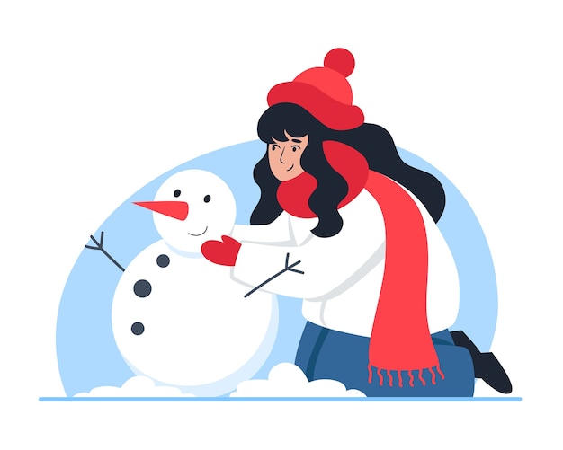 Женщина лепит снеговика, зимняя прогулка, новогоднее настроение