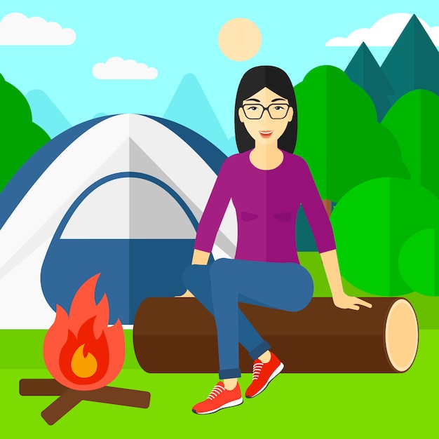 Woman sitting at camp.