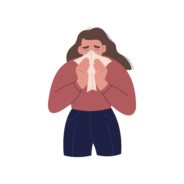 La donna starnutisce e soffia il naso in un fazzoletto. la ragazza malata soffre di allergie o raffreddore