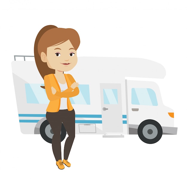 Woman standing in front of motor home.