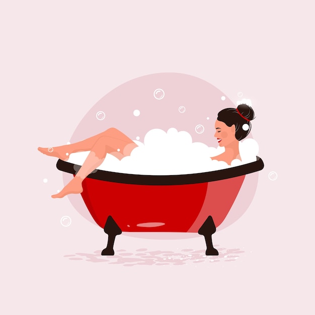 A woman taking a bubble bath with her legs crossed in a red tub.