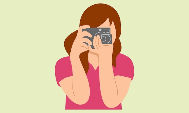 Woman taking pictures by digital camera