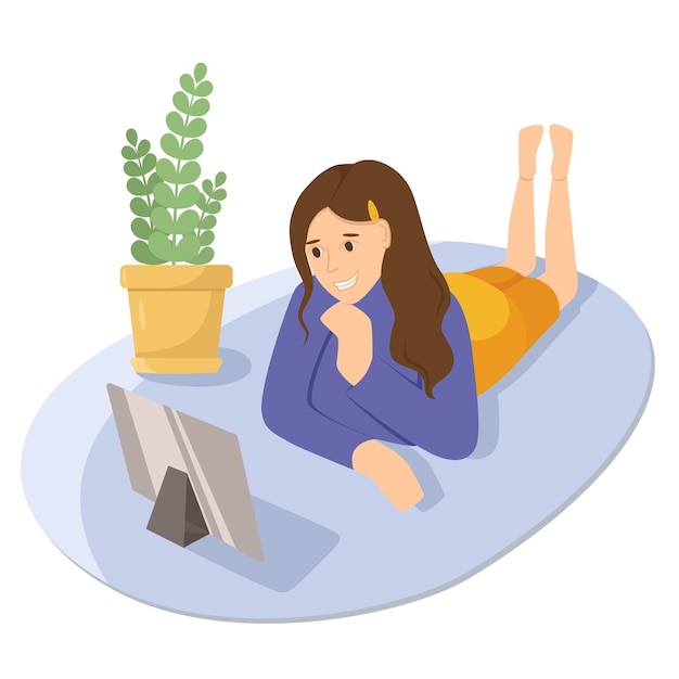 Woman talking on tablet. Working from home. Online shopping.Girl lying on floor using laptop