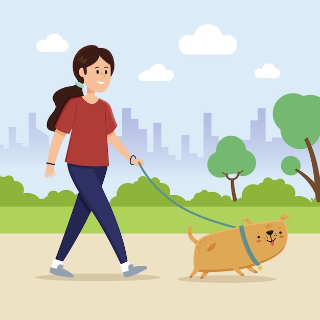 公園で犬を歩く女性