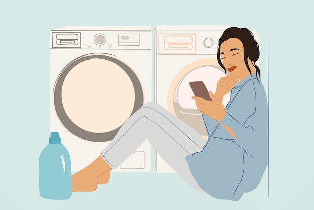 Woman washes and dries clothes in laundry