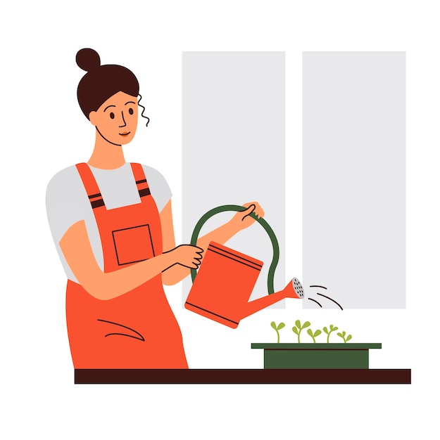 Woman watering fresh herbs growing at home vegetable garden