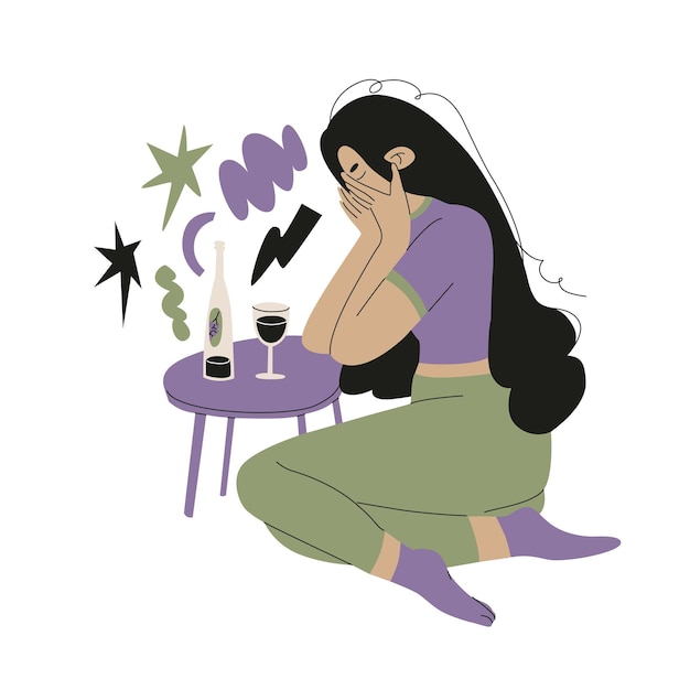 Vector a woman with black long hair is crying on the flor covering her face with her hands at a table with a bottle of wine and a glass female alcoholism dependence and loneliness vector illustration