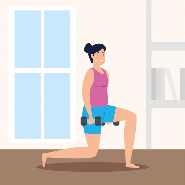 Woman with dumbbells in the house