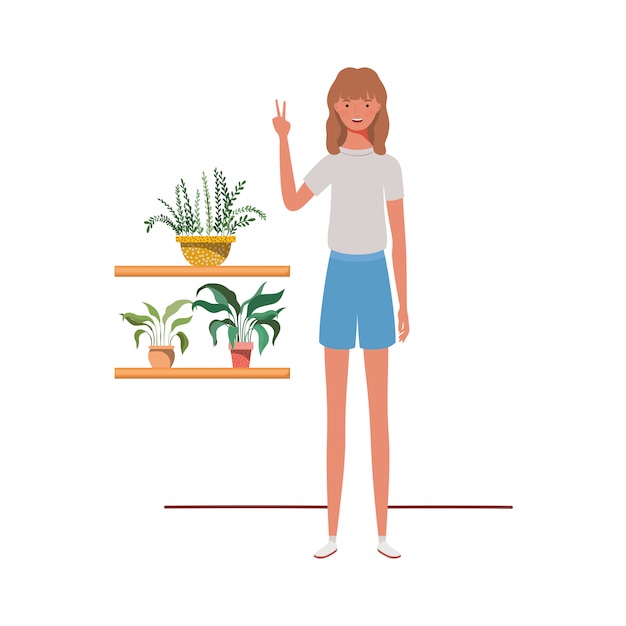 Donna con piante d'appartamento e appendini macramè