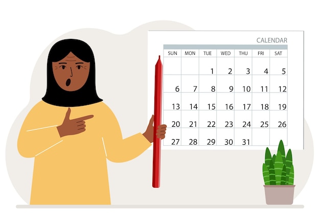 A woman with a pencil in his hand creates a calendar Planning and time management responsible employee plans meetings and events