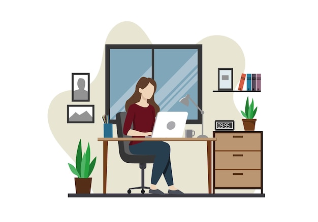 woman working from home at desk with laptop