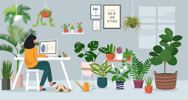 Женщина работает на ноутбуке дома, украшенном комнатными растениями