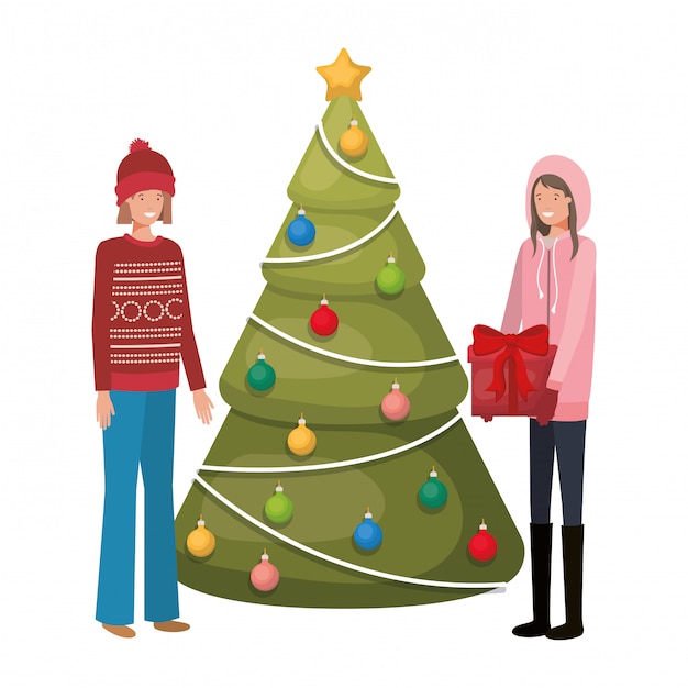 Donne con albero di natale e avatar regalo