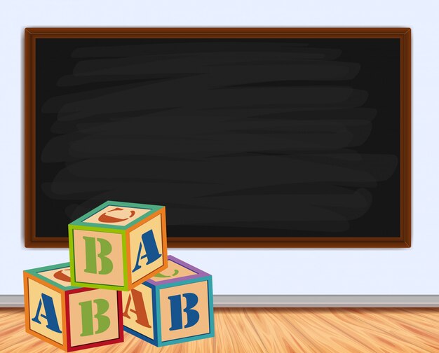 Wood cubes with letters and blackboard