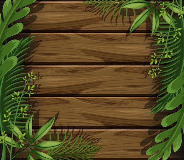 Wooden background with green leaves