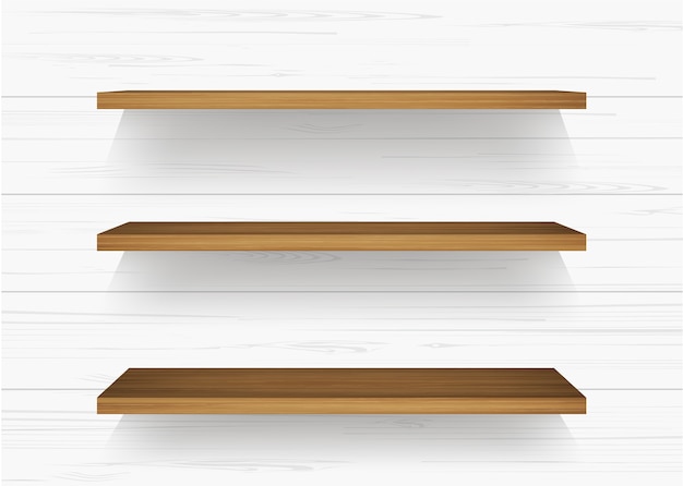 Wooden shelf on white wall.