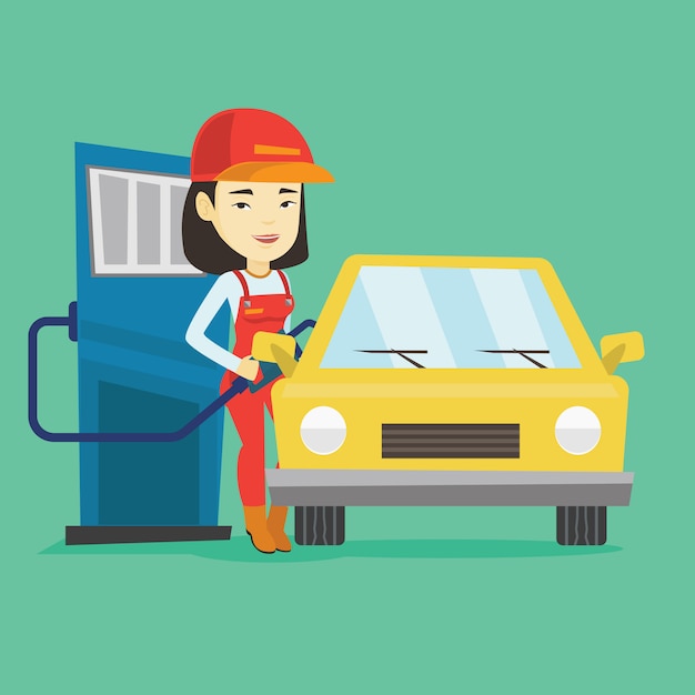 worker filling up fuel into car at the gas station