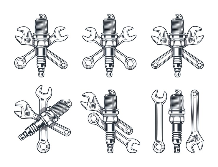 Wrench, adjustable wrench and spark plug. Repair tools isolated on white background.