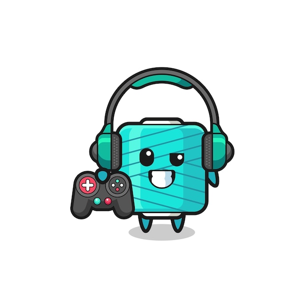 Vector yarn spool gamer mascot holding a game controller cute design