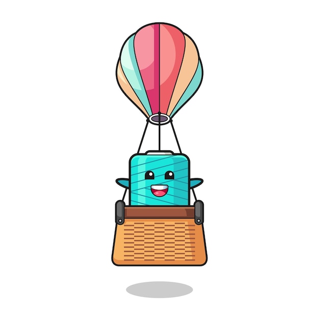 Yarn spool mascot riding a hot air balloon  cute design