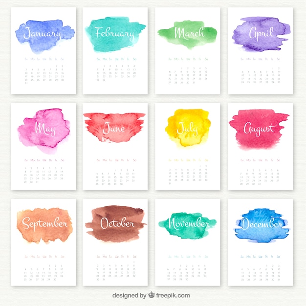 Vector yearly calendar with watercolor stains