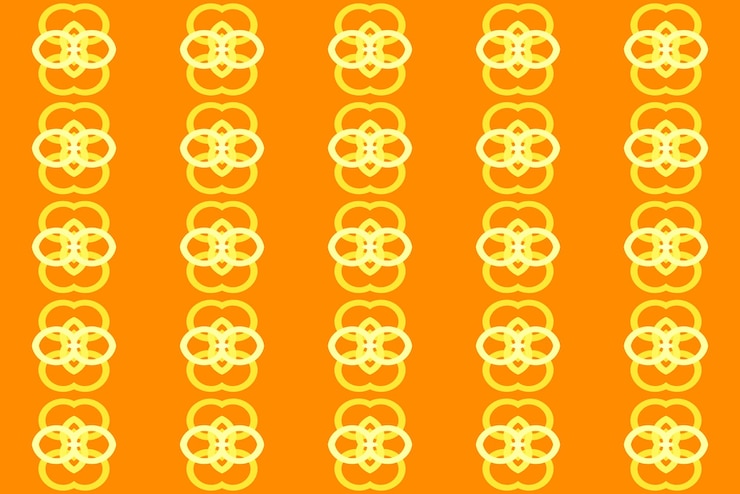 Vector a yellow background with a pattern of flowers on it