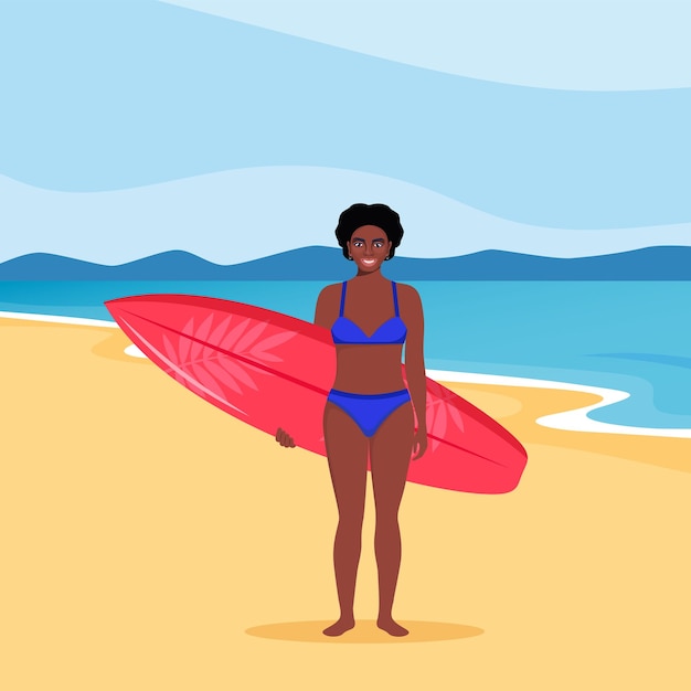 アフリカ系アメリカ人の女性サーファーがサーフボードを持ってビーチに立って微笑んでいる