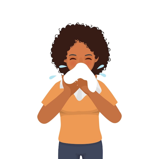 Young African woman with runny nose blowing her nose with a napkin