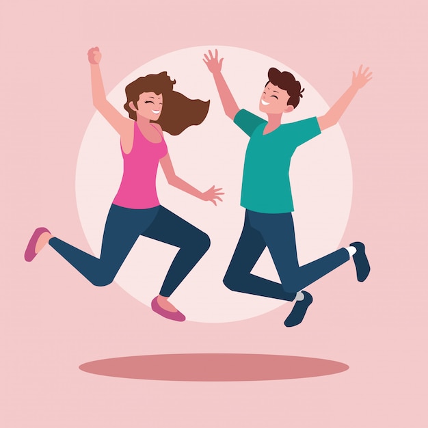 Young couple celebrating with hands up