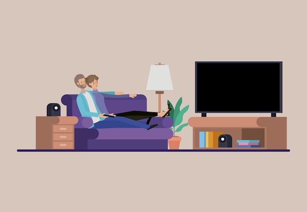 Young couple watching tv on the livingroom