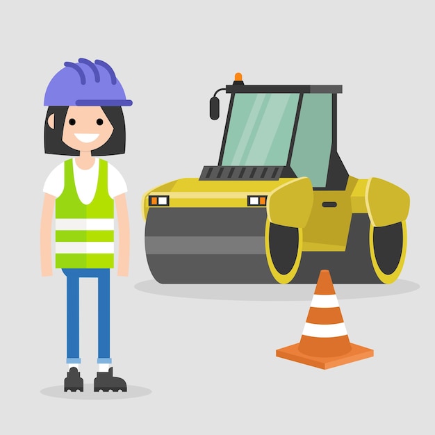 Young female engineer wearing a hard hat and a reflecting vest.