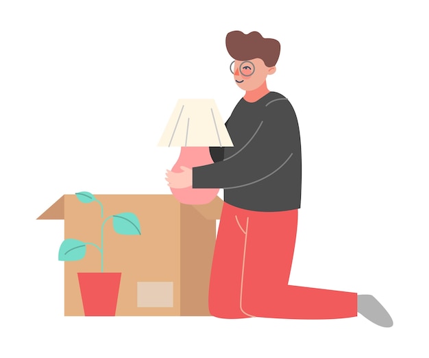 Молодой человек упаковывает или распаковывает вещи в картонную коробку Мужчина переезжает в новый дом Векторная иллюстрация