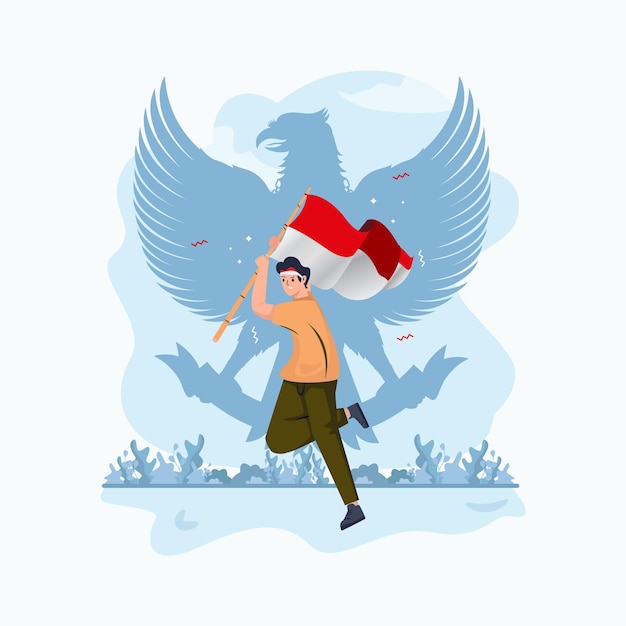 A young man waving indonesian flag with garuda Indonesia symbol