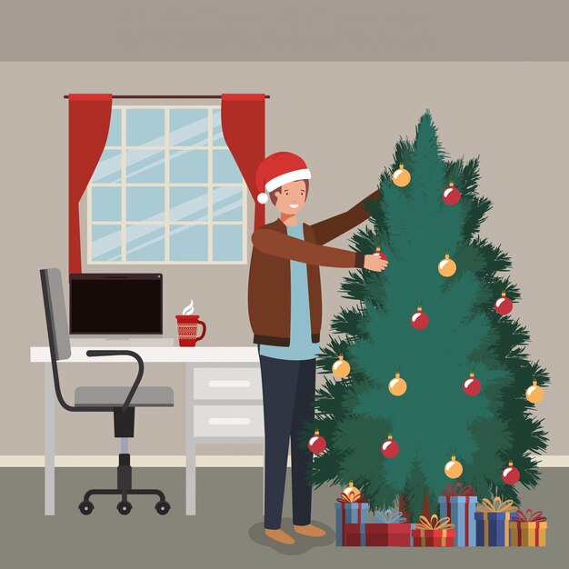 young man with pine tree in the office
