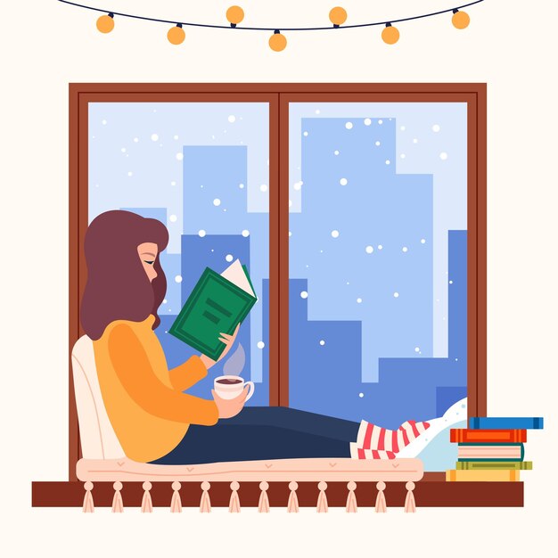 窓辺に座って本を読んでいる若い女性