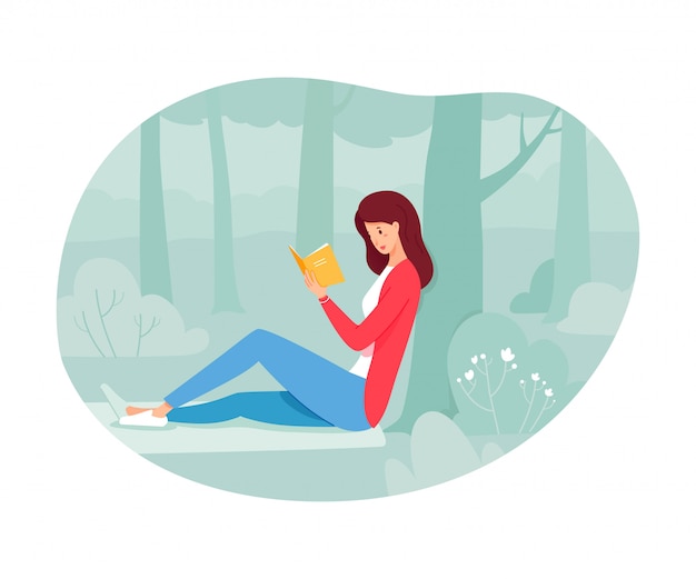 Young woman reading paper book under tree in forest