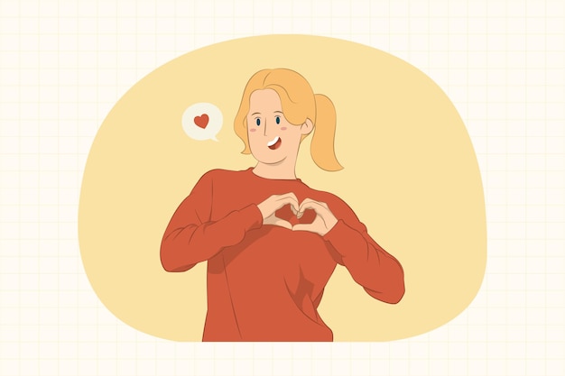 Young woman showing shape heart with hands concept