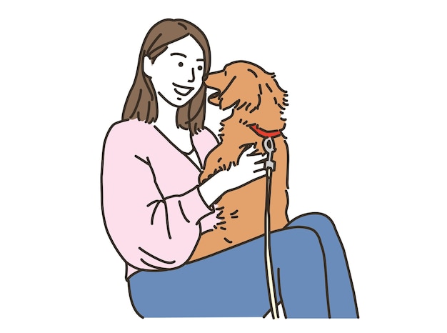 笑顔で犬と遊んでいる若い女性