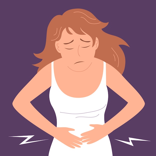 A young woman suffers from abdominal pain