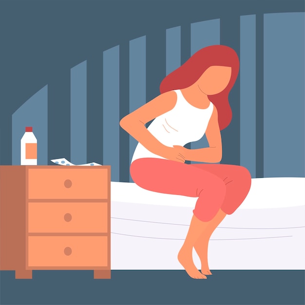a young woman suffers from abdominal pain