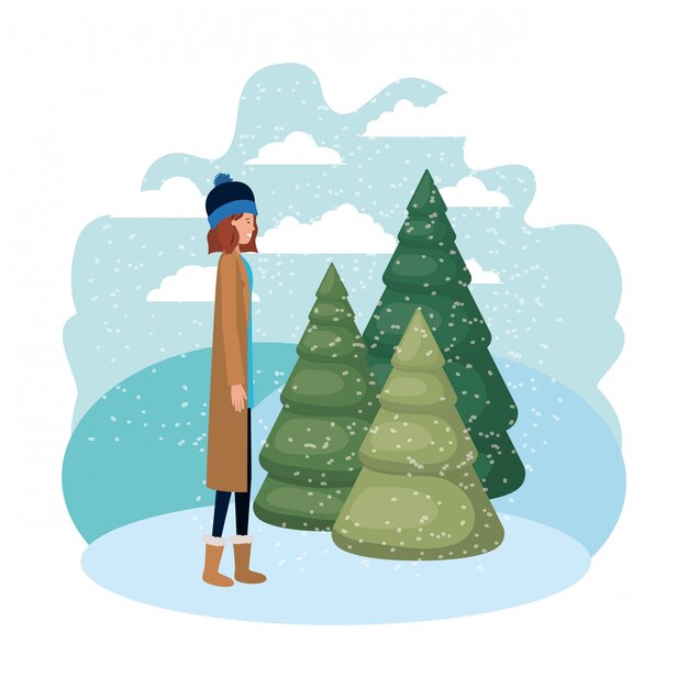 Young woman with winter clothes and winter pines