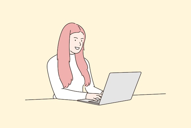 A young woman working at home using a laptop with a happy expression