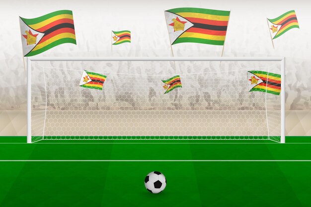 Zimbabwe football team fans with flags of Zimbabwe cheering on stadium penalty kick concept in a soccer match