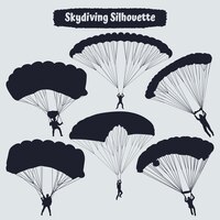 Vector zwarte silhouetten deltavlieger of parachutespringen