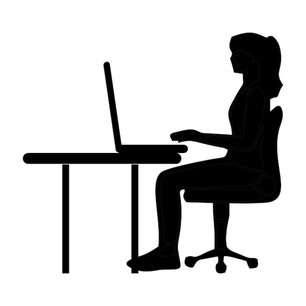 a woman sits at a desk with a laptop on her lap
