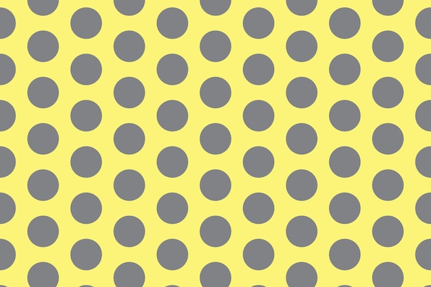 a yellow background with a pattern of dots