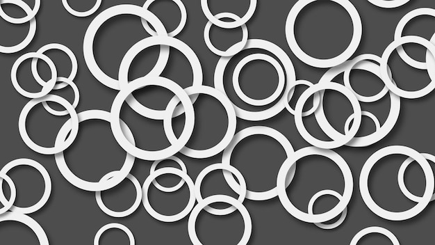 Abstract illustration of randomly arranged white rings with soft shadows on black background