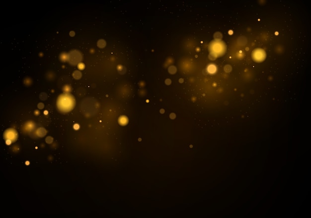 bokeh effect. texture glitter. sparkling magical gold yellow dust particles.