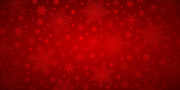 Christmas background of various complex big and small snowflakes in red colors