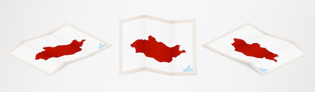 folded map of mongolia in three different versions.